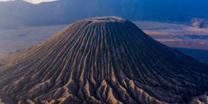 Aerial,View,Of,The,Volcanic,Cinder,Cone,Mount,Batok,In